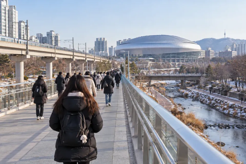 AI-generated illustration of winter concert travel near Seoul's Guil Station approach