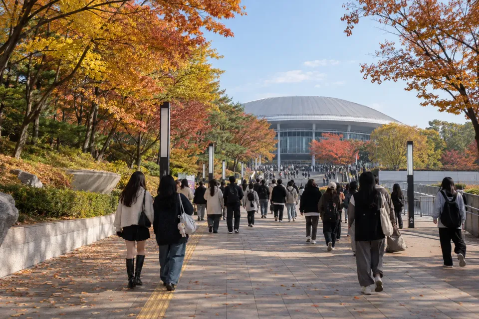 Illustrative autumn approach from Olympic Park toward a Seoul dome concert